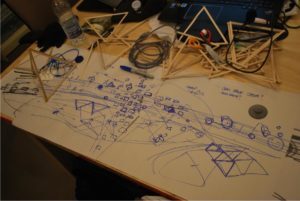 end of day sketch and wooden triangles